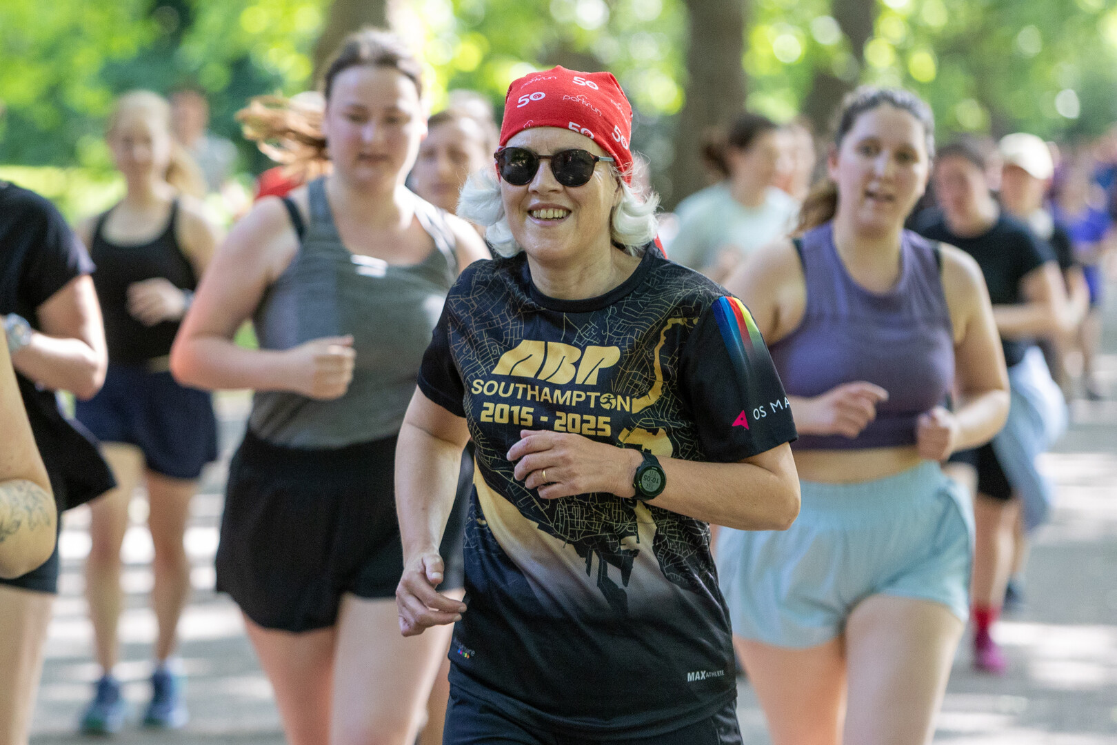 Runner participating in Battersea Park Run.