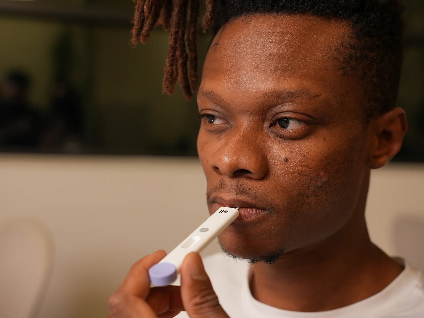 Person holding an at-home cortisol test.