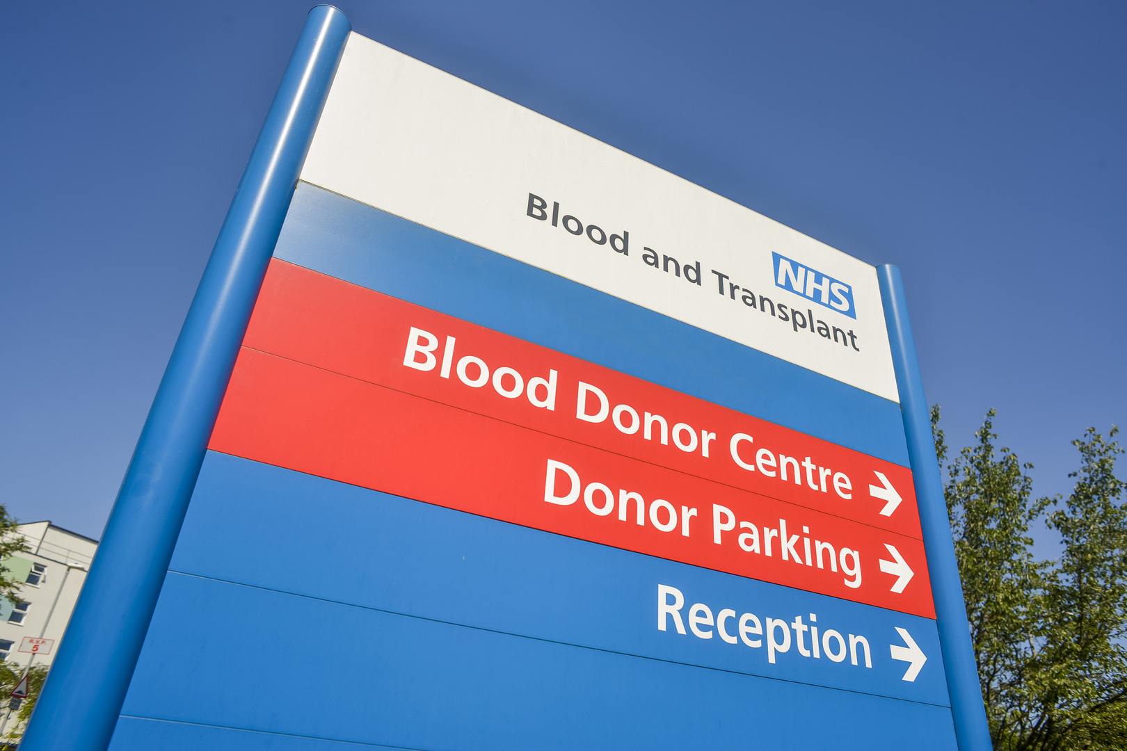 NHS Blood and Transplant sign with directions to the Blood Donor Centre, Donor Parking, and Reception.